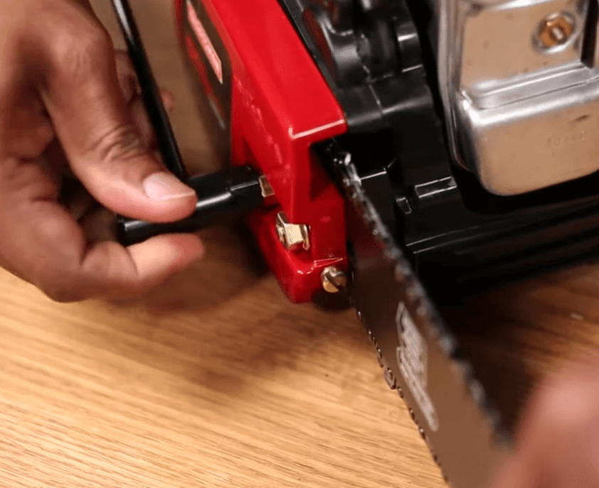 adjusting tension on a Craftsman chainsaw