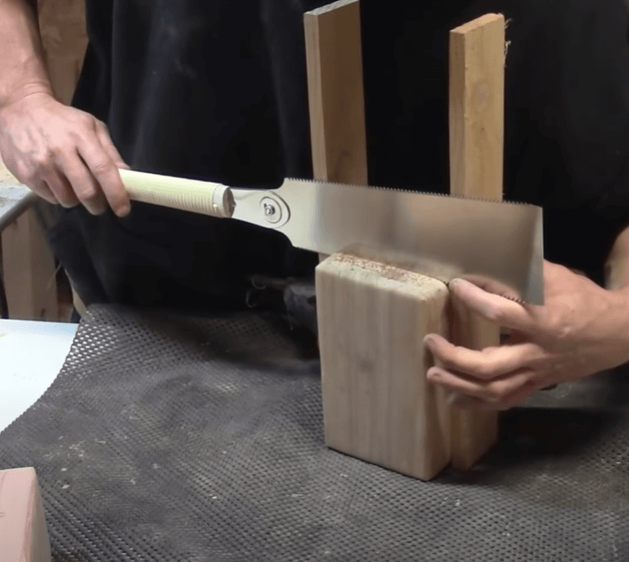 sawing cedar wood with Gyokucho Ryoba Double Edge Razor Saw