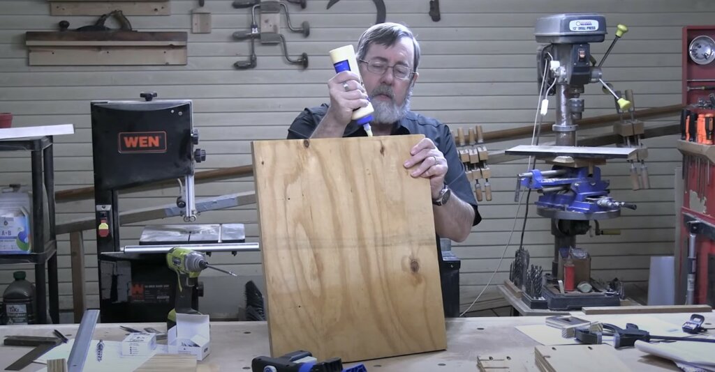 Applying wood glue to the edge of the clamp holder