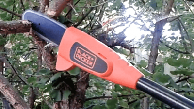 BLACK+DECKER 20V MAX Pole Saw cutting wood