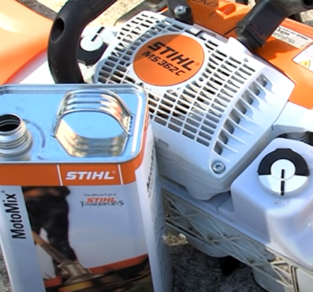 Stihl chainsaw and fuel can