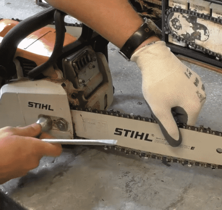 adjusting chain tension screw