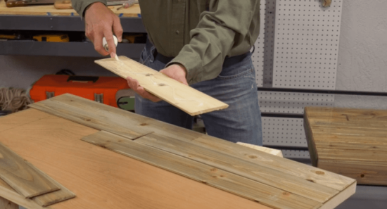 applying flex seal on wood