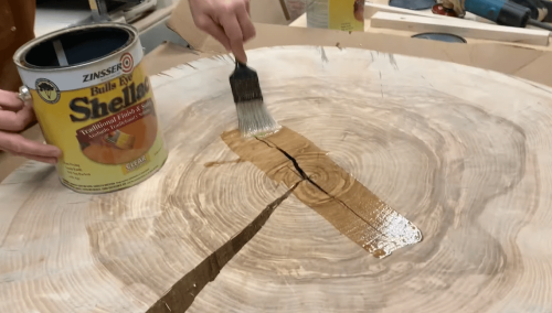 applying shellac finish on wood