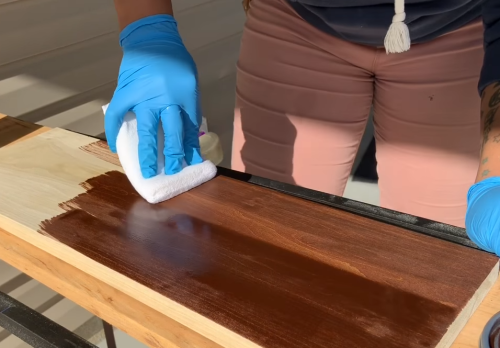 applying the stain on aspen wood