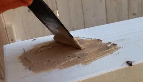 applying wood filler