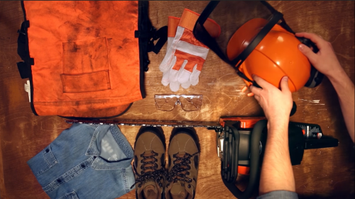 chainsaw and protective gear