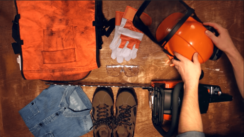 chainsaw and protective gear