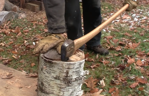 cut wood with axe