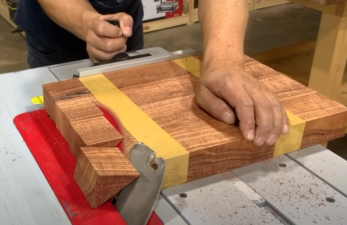 cutting pieces of mahogany wood