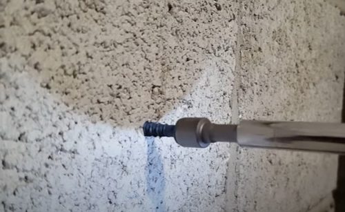 drilling hole in wall