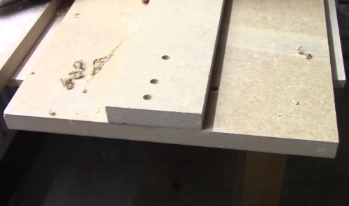 drilling small holes in the wood