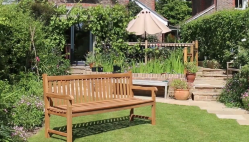 garden bench treated with Roxil Wood Protection Cream Instant Waterproofing Clear Sealer