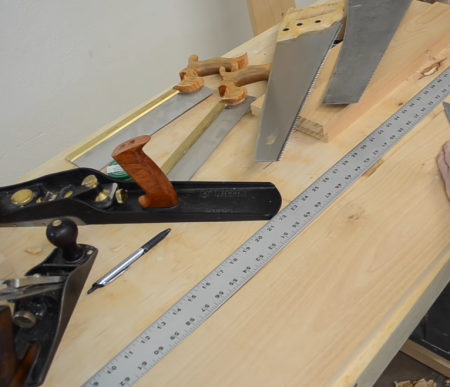 hand saws, plane, measuring tools