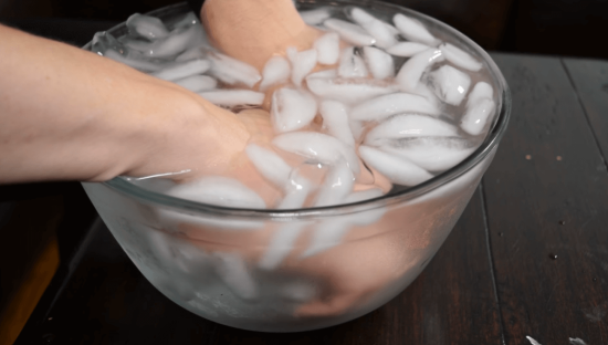 hands in water and ice