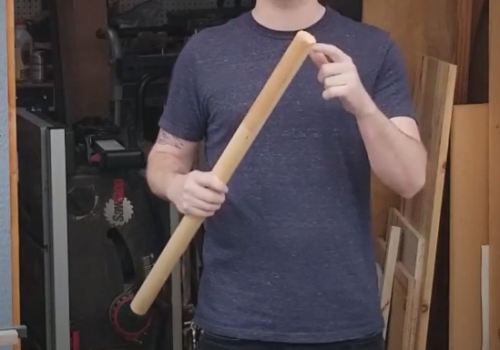 holding a wooden closet rod