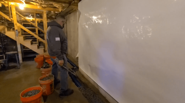 installing basement drainage system