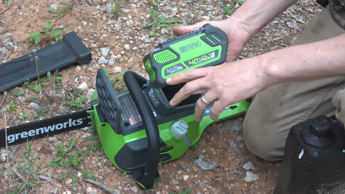 installing battery on Greenworks 40V 16-Inch Cordless Chainsaw