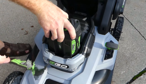 installing battery on a lawn mower