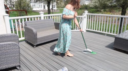 lady cleaning deck