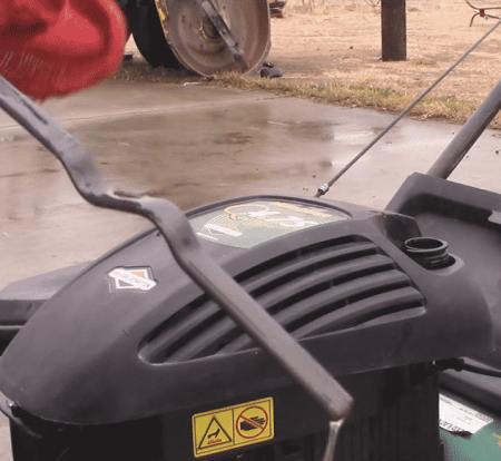 lawn mower overfilled with oil