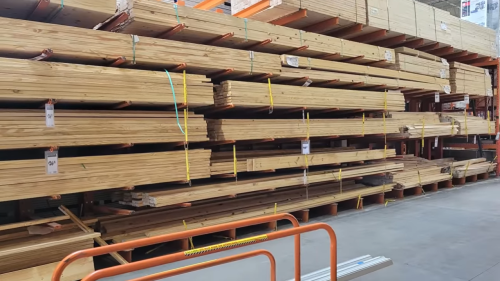 lumber neatly stacked in a home depot