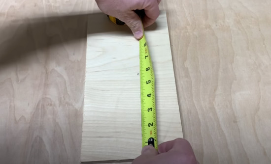 measuring a wooden board
