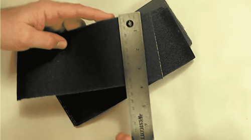 measuring the dimensions of Miady 120 To 3000 Assorted Grit Sandpaper