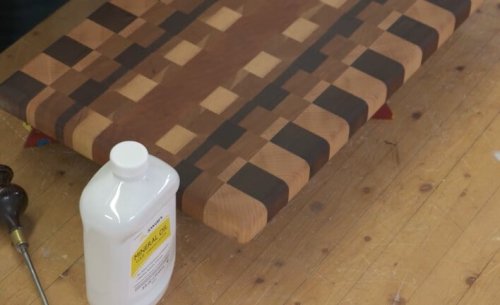 mineral oil and wooden board