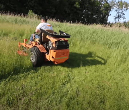 mowing with SCAG mower