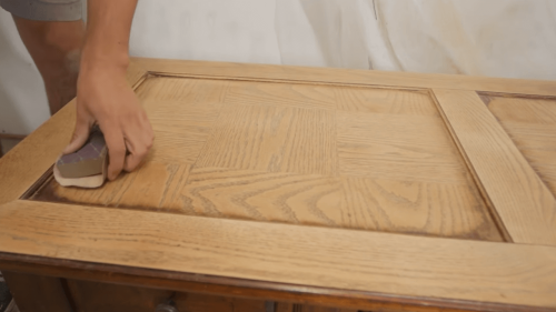 sanding wooden surface