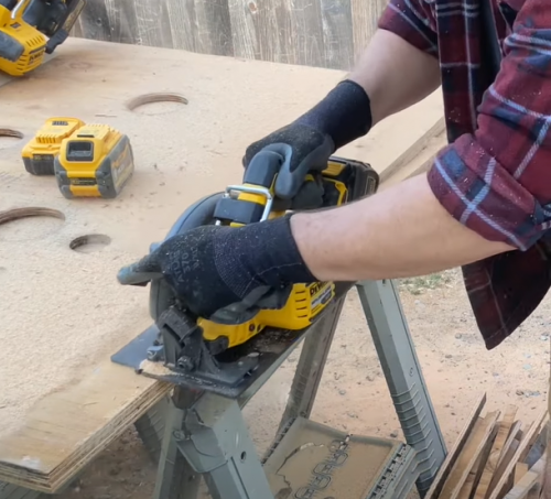 operating a DeWalt circular saw