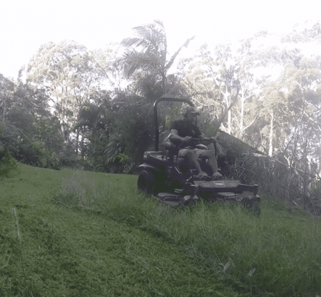 operating a riding mower to slopy ground