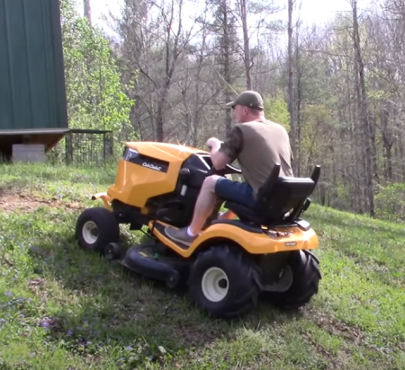 person on a riding mower
