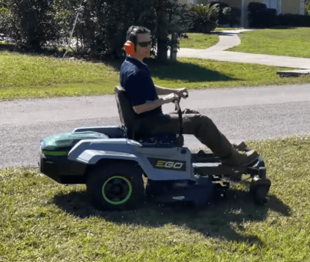person operating EGO Power+ ZT4204L Riding Mower