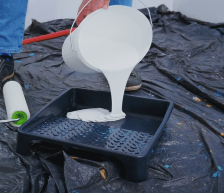 pouring paint primer