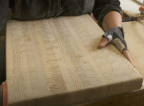 sanding larch wood board