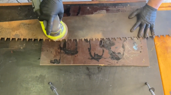 sanding rust off antique crosscut saw