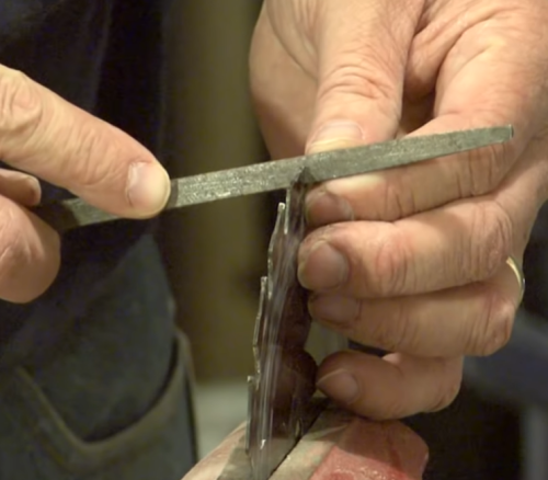 sharpening circular saw blade with a file