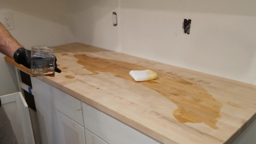 staining kitchen counter top with HOPE'S 100% Pure Tung Oil