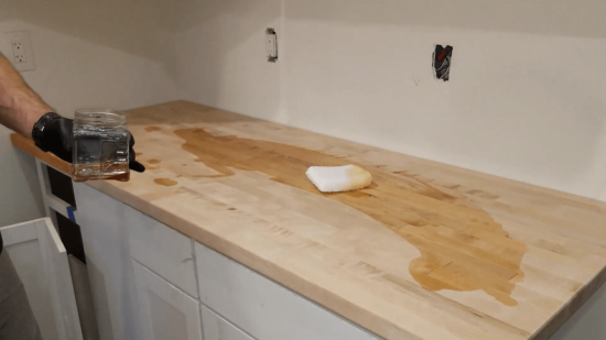 staining kitchen counter top with HOPE'S 100% Pure Tung Oil