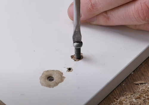 using larger screws on wood holes