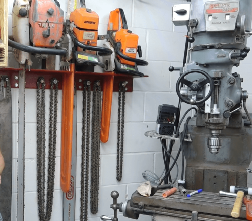 wall hanging chainsaw rack