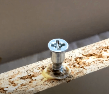 wood glue into stripped screw hole